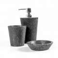Modern bathroom accessories set in lava stone Montiano