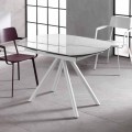Extensible table with ceramic plan and metal legs Lozzolo